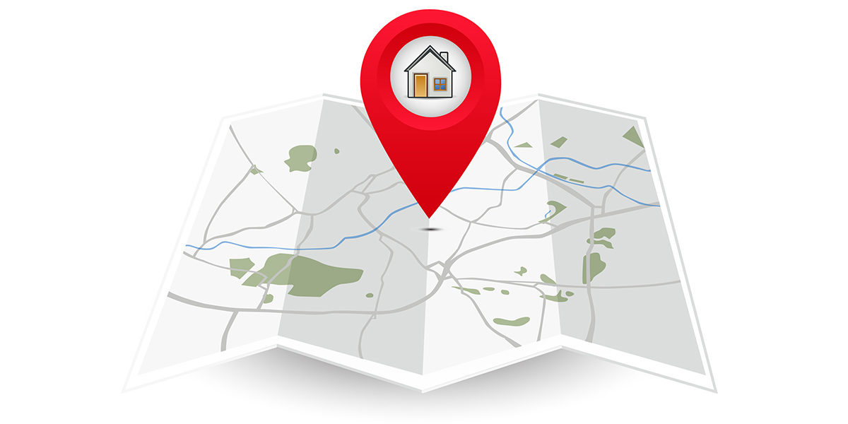 Eine rote Ortsmarkierung zeigt auf einer Karte, wo sich eine Immobilie befinden soll | Immobilie finden
